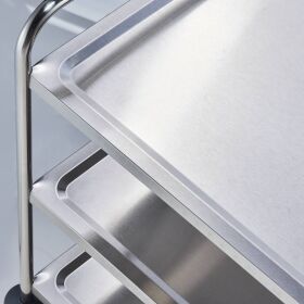 Serving trolley made of stainless steel, with three...
